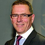 Claude Riverin, Adm.A.